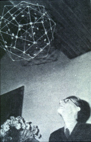 Escher contemplating his nested set of Platonic Solids